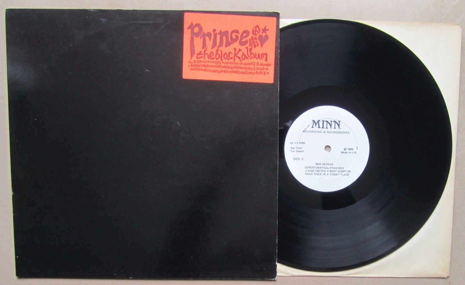 popsike.com - PRINCE. THE BLACK ALBUM. UK VINYL LP. 1988. MINN RECORDING.  ORANGE STICKER. N/M - auction details